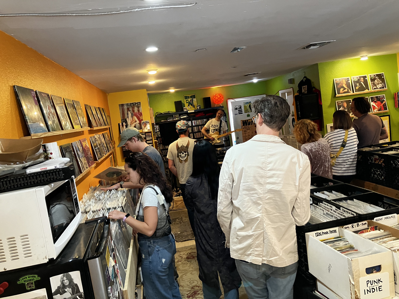 Customers browsing at Love Wheel Records in Austin.