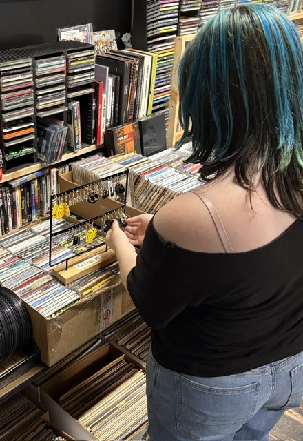 A customer digging through records at Berkshirecat.