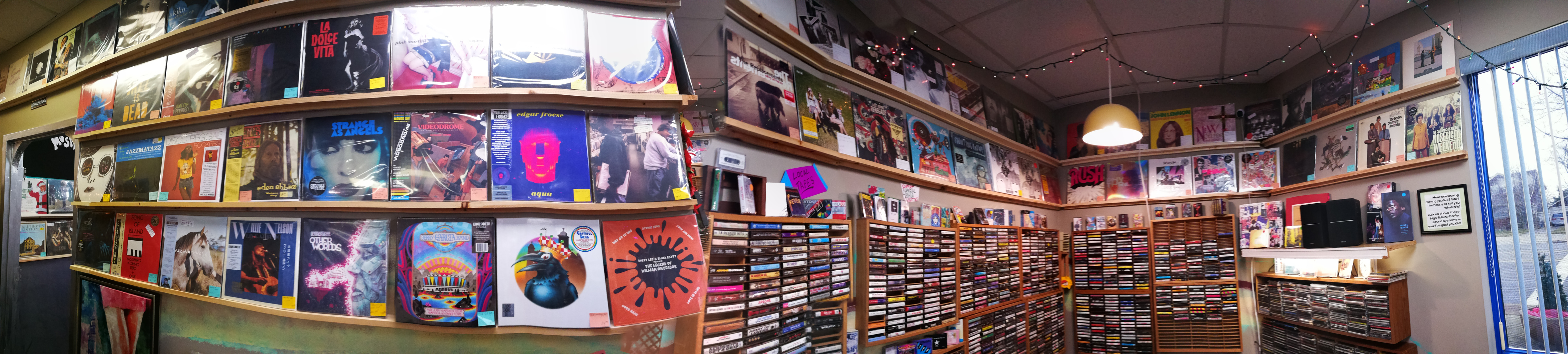 Wide record wall at The Current Year
