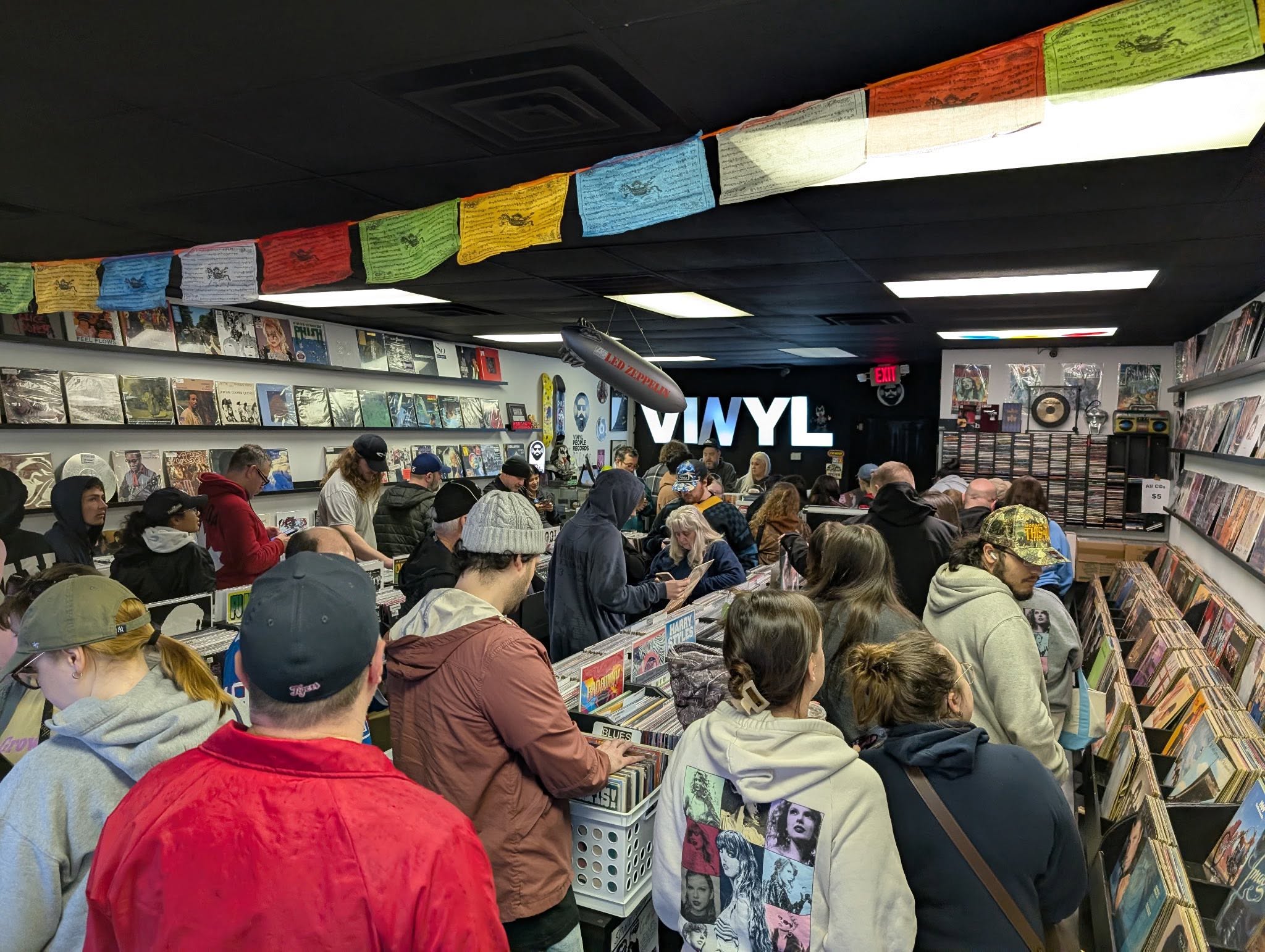 Customers digging at Vinyl People Records.