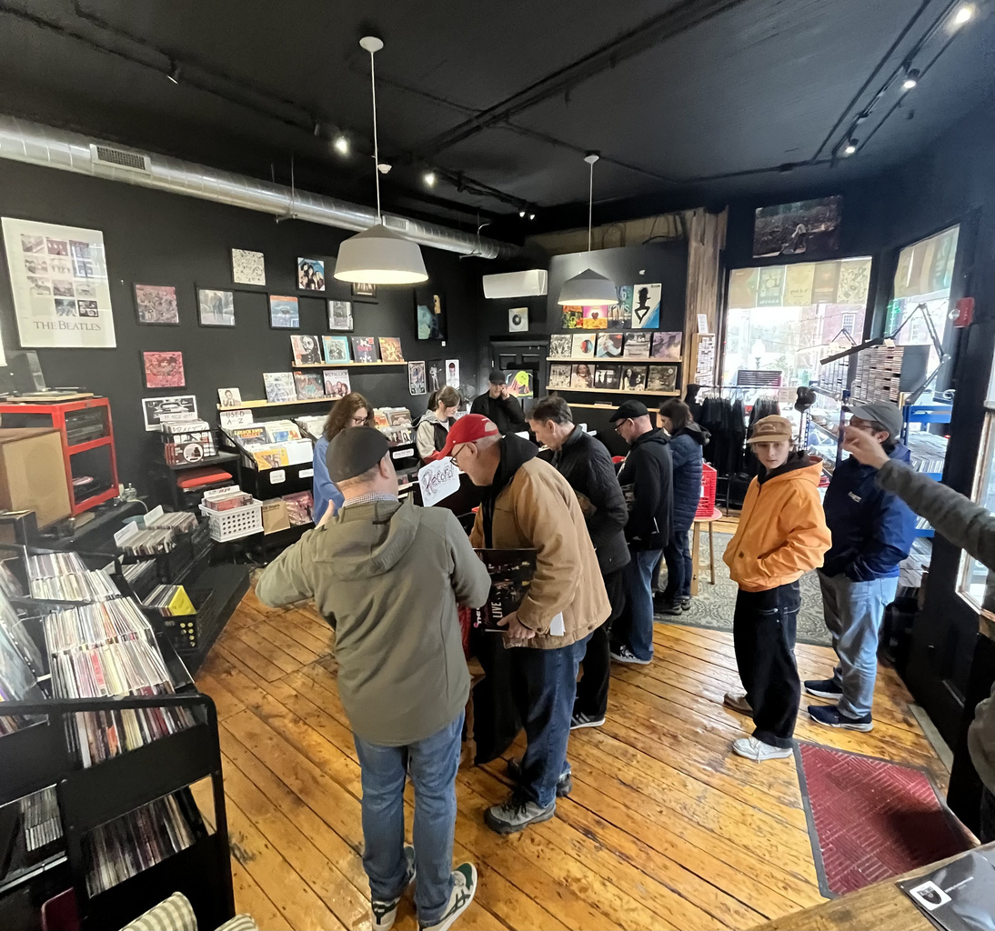 Customers inside Mel's Record Shop