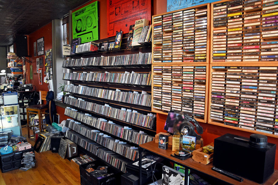 Cassette wall and shelves at Analog Vault