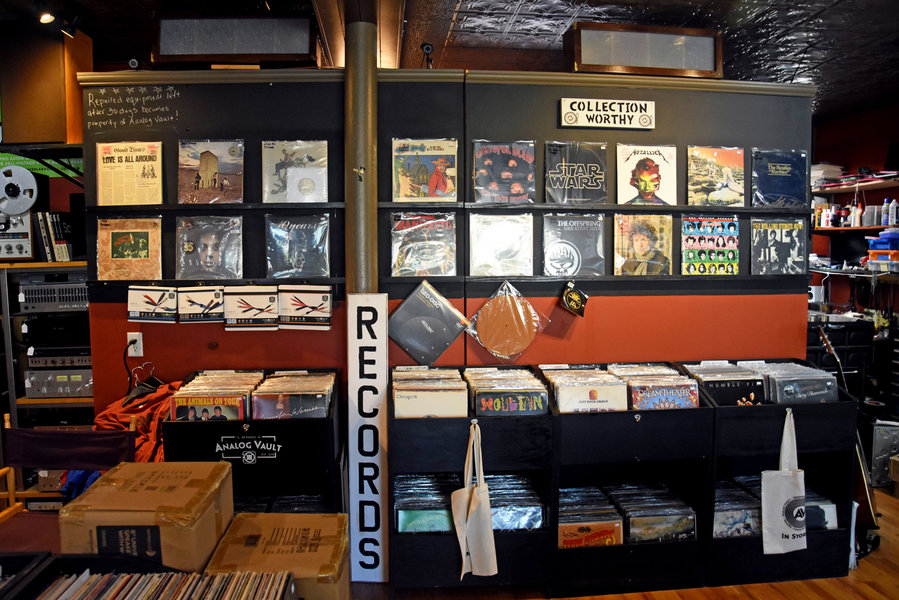 Collection worthy records wall at Analog Vault