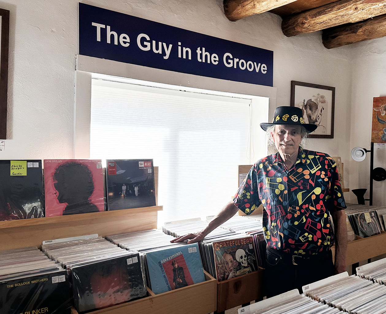 Guy in the Groove owner inside the Santa Fe record shop