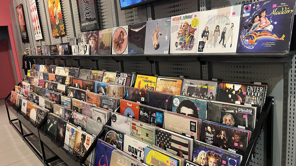 Music wall and featured records at Razzle Dazzle